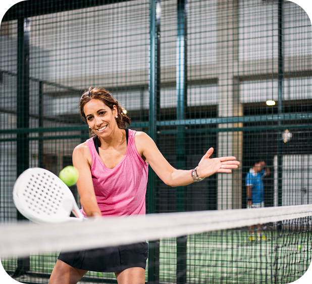 Padel rally on indoor court